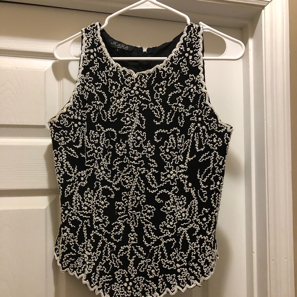 Dressy sleeveless blouse and slacks
